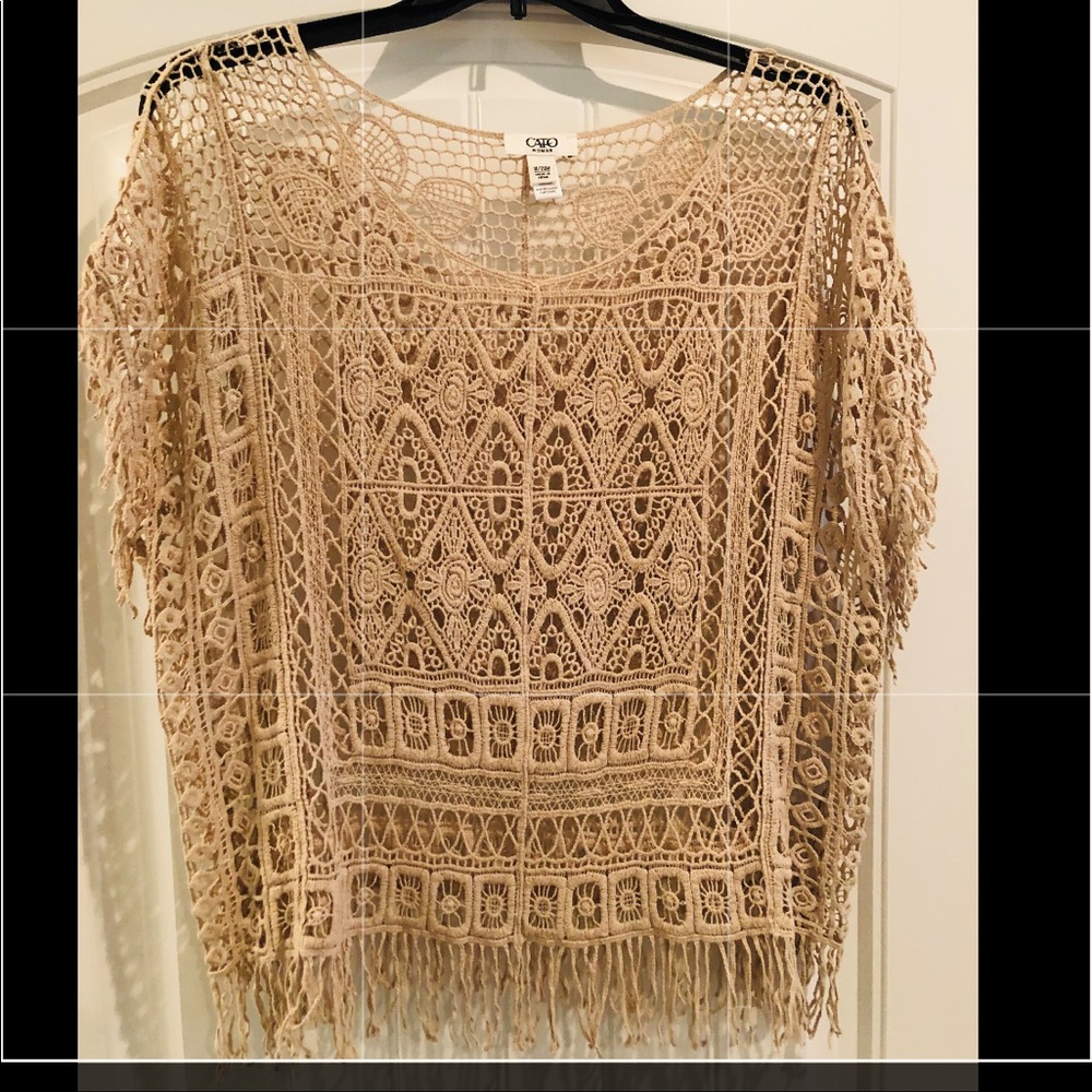 Crocheted beige overlay with fringe